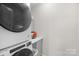 Convenient laundry area with stackable washer and dryer and built-in storage at 1177 Bannockburn Ave, Rock Hill, SC 29732