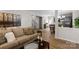 Spacious living room with hardwood floors open to dining area and kitchen, featuring modern decor and a cozy atmosphere at 1177 Bannockburn Ave, Rock Hill, SC 29732