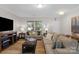 Inviting living room featuring comfortable seating, stylish decor, and lots of natural light at 1177 Bannockburn Ave, Rock Hill, SC 29732