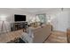 Cozy living room featuring a large TV, comfortable seating, and wood-look flooring at 1177 Bannockburn Ave, Rock Hill, SC 29732