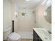 Updated bathroom featuring modern tile shower and vanity sink at 123 Oak St, Chester, SC 29706