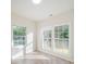 Bright room with stylish flooring and large windows offering ample natural light at 123 Oak St, Chester, SC 29706