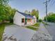 Well-maintained home with a neat front lawn, newly painted exterior and a wide driveway at 123 Oak St, Chester, SC 29706
