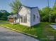 Angle view of cozy single-story home with fresh lawn and newly painted exterior at 123 Oak St, Chester, SC 29706