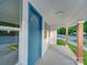 Inviting front porch with blue door and freshly painted exterior, leading into a cozy home at 123 Oak St, Chester, SC 29706