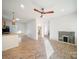 Spacious living room with an open-concept design, herringbone floors, and a modern fireplace at 123 Oak St, Chester, SC 29706