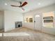 Bright living room with freshly painted walls, fireplace, and herringbone floors at 123 Oak St, Chester, SC 29706