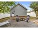 Inviting backyard with outdoor seating on the patio; perfect for relaxation and entertainment at 132 E Morehouse Ave, Mooresville, NC 28117