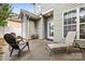 Relaxing backyard patio with comfortable seating; ideal for enjoying the outdoors at 132 E Morehouse Ave, Mooresville, NC 28117