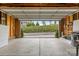 Spacious garage with ample storage, laundry hookups, and open view to the neighborhood at 132 E Morehouse Ave, Mooresville, NC 28117