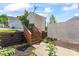 A backyard includes a shed, wooden stairs, a wooden fence, and plants at 13838 Hill St, Huntersville, NC 28078