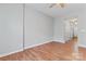 Large bonus room area featuring hardwood floors and a ceiling fan at 13838 Hill St, Huntersville, NC 28078