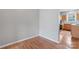Hallway leading to an open kitchen with stainless steel appliances at 13838 Hill St, Huntersville, NC 28078