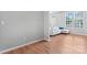 Open living room showcasing natural light and hardwood floors at 13838 Hill St, Huntersville, NC 28078
