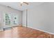 Living room features french doors opening to the outside at 13838 Hill St, Huntersville, NC 28078
