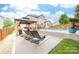 A stunning backyard with a pool, gazebo, lounge chairs, and manicured landscaping at 143 Heywatchis Dr, Mooresville, NC 28115