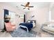 Charming bedroom with a cozy bed, soft lighting, and stylish decor at 143 Heywatchis Dr, Mooresville, NC 28115
