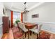 Bright dining room with a large window, elegant decor, and a spacious table, perfect for Gathering gatherings at 143 Heywatchis Dr, Mooresville, NC 28115