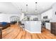 Bright kitchen with modern appliances, white cabinets, and an open layout, perfect for cooking and entertaining at 143 Heywatchis Dr, Mooresville, NC 28115
