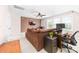 Comfortable living room with a large brown sofa, tv, desk and modern ceiling fan at 143 Heywatchis Dr, Mooresville, NC 28115