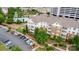 Aerial view of property showcasing the pool, landscaping, and multiple parking spaces at 14857 Santa Lucia Dr, Charlotte, NC 28277