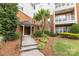 Building exterior with a landscaped entrance and a well-maintained facade at 14857 Santa Lucia Dr, Charlotte, NC 28277