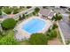 Aerial view showcasing a large community pool and surrounding lounge area at 14857 Santa Lucia Dr, Charlotte, NC 28277