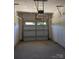 Unfinished one car garage with windows and door opener at 1604 N Main St, Mount Holly, NC 28120