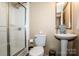Cozy bathroom featuring a pedestal sink and step-in shower at 161 Crystal Bay Dr, Mooresville, NC 28115