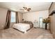 Inviting bedroom with a ceiling fan and decorative accents at 161 Crystal Bay Dr, Mooresville, NC 28115