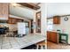 Well-equipped kitchen featuring tiled countertops, and a breakfast bar at 161 Crystal Bay Dr, Mooresville, NC 28115