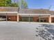 Spacious covered parking area with multiple bays, offering ample space for vehicles and storage at 161 Perrin Pl, Charlotte, NC 28207