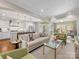 Bright living room with elegant furnishings and an open floor plan to the gourmet kitchen at 161 Perrin Pl, Charlotte, NC 28207