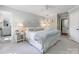 Serene main bedroom with ensuite bathroom and a soft, neutral color palette at 161 Perrin Pl, Charlotte, NC 28207