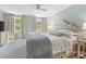 Large main bedroom with plenty of natural lighting, ensuite bathroom, and plush carpet at 161 Perrin Pl, Charlotte, NC 28207
