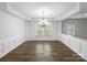 Formal dining room featuring wood floors, a chandelier, wainscotting and lots of natural light at 1814 Tradd Ave, Clover, SC 29710