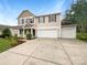 Charming two-story home with landscaped yard and a three car attached garage at 1814 Tradd Ave, Clover, SC 29710