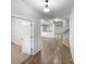Spacious foyer with hardwood flooring, white trim, and an open view to other living spaces at 1814 Tradd Ave, Clover, SC 29710