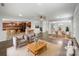 Open-concept living room flowing to the kitchen and dining area, virtually staged at 1814 Tradd Ave, Clover, SC 29710