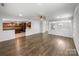 Open-concept living room flowing to the kitchen and dining area at 1814 Tradd Ave, Clover, SC 29710