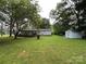 Spacious backyard with lush greenery, perfect for outdoor activities and relaxation at 1925 Mt Hope Church Rd, Salisbury, NC 28146