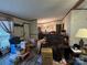 Bright living room with wood floors, and a dining space, ready for move-in at 1925 Mt Hope Church Rd, Salisbury, NC 28146