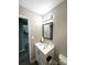 Bathroom features a white vanity, modern fixtures, and warm lighting for a clean aesthetic at 1928 Londonberry Dr, Rock Hill, SC 29730