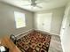 Bedroom with a geometric-patterned rug, natural light, and closet at 1928 Londonberry Dr, Rock Hill, SC 29730