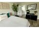 Cozy bedroom featuring natural light, white walls, neutral decor, and attached bathroom at 1928 Londonberry Dr, Rock Hill, SC 29730