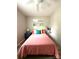 Bedroom featuring bright bedding, neutral-toned walls, wood-look floors, and soft lighting at 1928 Londonberry Dr, Rock Hill, SC 29730