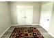 Cozy bedroom featuring a geometric-patterned rug and ample closet space at 1928 Londonberry Dr, Rock Hill, SC 29730