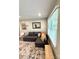Living room featuring a comfortable sofa and natural light from a window at 1928 Londonberry Dr, Rock Hill, SC 29730