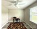 Bright home office with a geometric-patterned rug, desk, and natural light at 1928 Londonberry Dr, Rock Hill, SC 29730