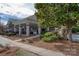 Charming community building with a covered patio and well-maintained landscaping at 19679 Wooden Tee Dr, Davidson, NC 28036